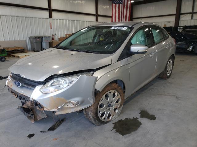 Photo 1 VIN: 1FAHP3F25CL240677 - FORD FOCUS SE 