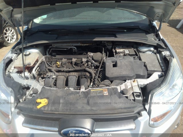 Photo 9 VIN: 1FAHP3F25CL248455 - FORD FOCUS 