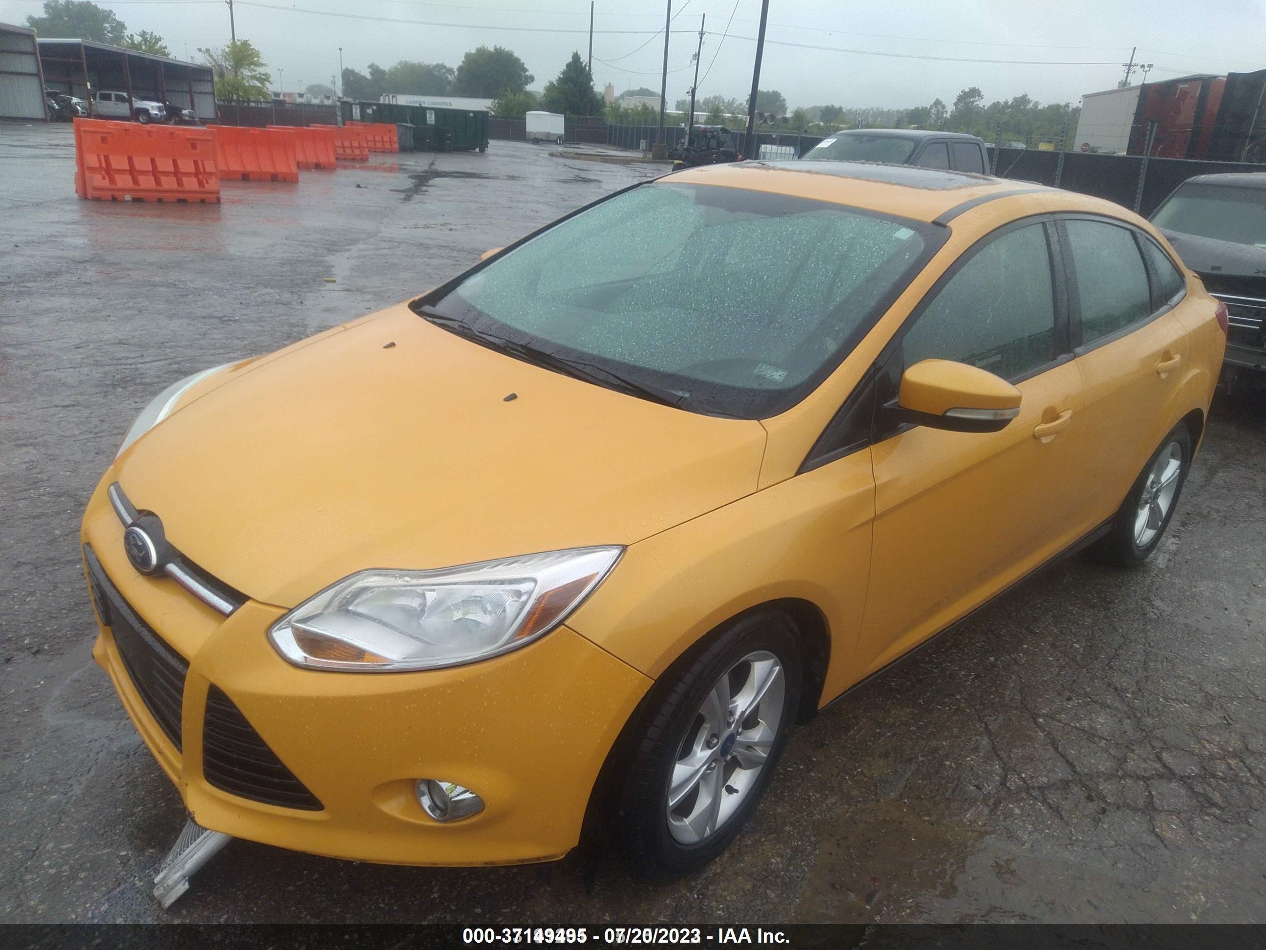 Photo 1 VIN: 1FAHP3F25CL262355 - FORD FOCUS 