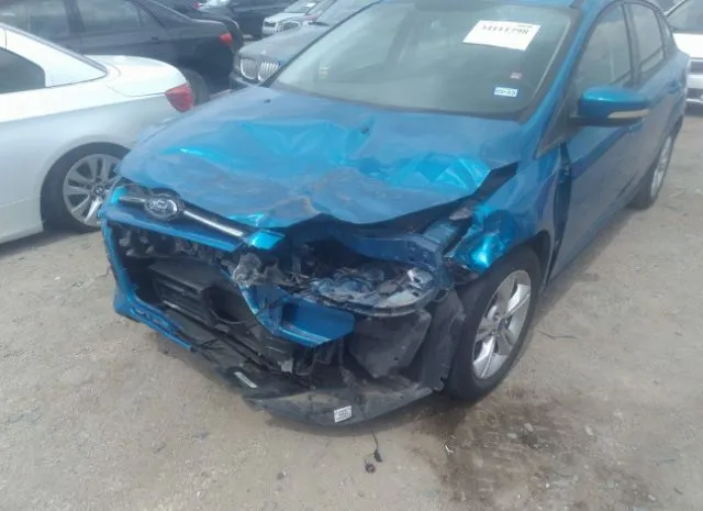 Photo 5 VIN: 1FAHP3F25CL279737 - FORD FOCUS 