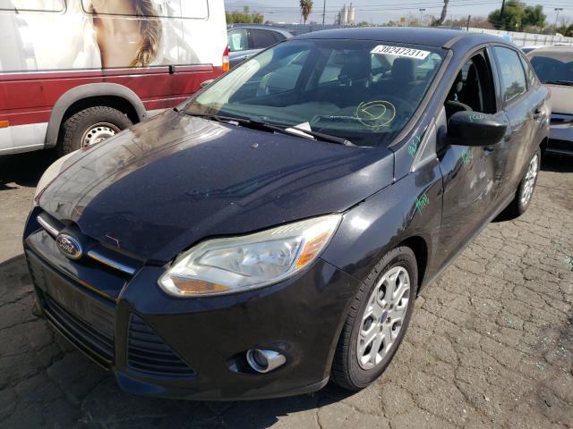 Photo 1 VIN: 1FAHP3F25CL302028 - FORD FOCUS SE 