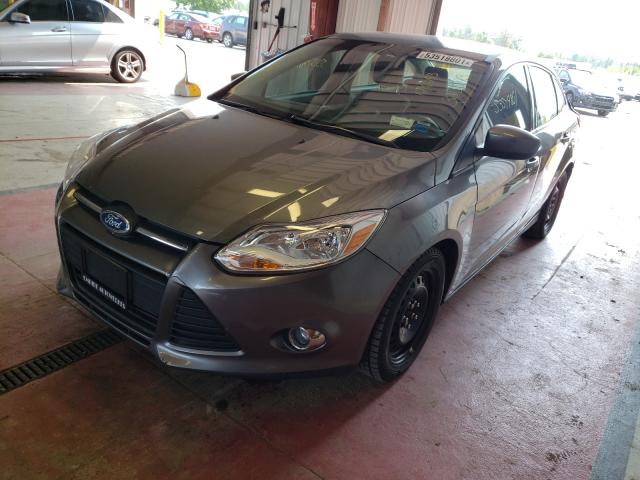 Photo 1 VIN: 1FAHP3F25CL323543 - FORD FOCUS SE 