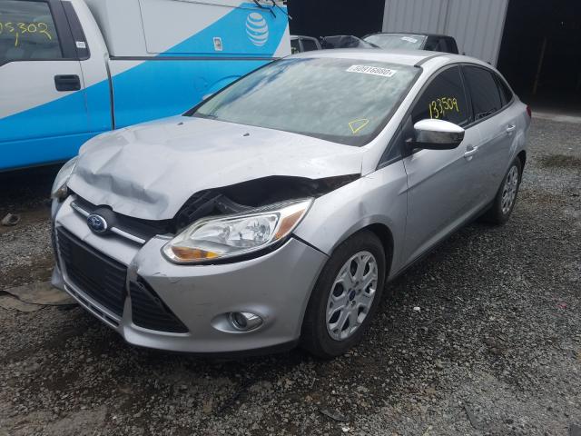 Photo 1 VIN: 1FAHP3F25CL324613 - FORD FOCUS SE 