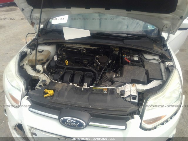 Photo 9 VIN: 1FAHP3F25CL361998 - FORD FOCUS 