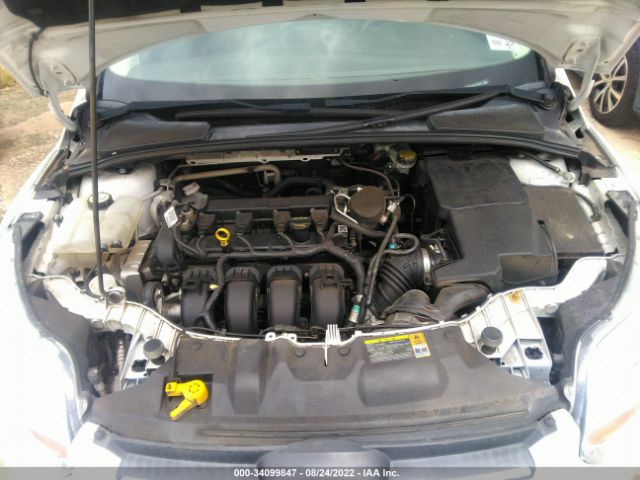 Photo 9 VIN: 1FAHP3F25CL370846 - FORD FOCUS 