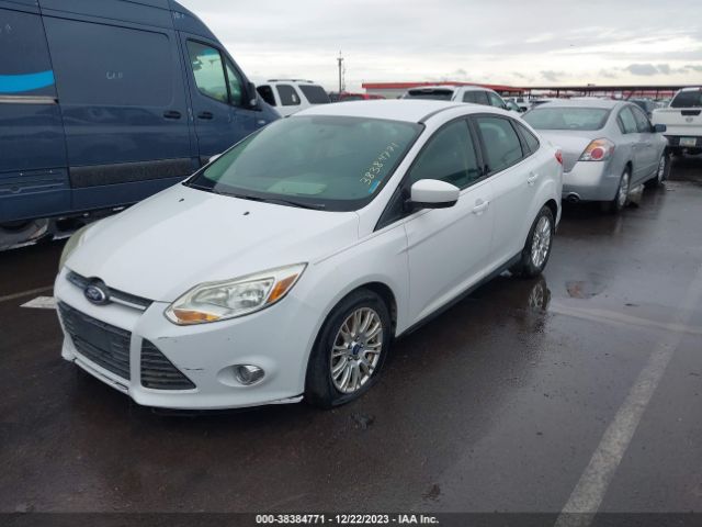 Photo 1 VIN: 1FAHP3F25CL372855 - FORD FOCUS 