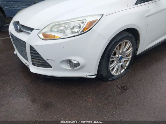 Photo 5 VIN: 1FAHP3F25CL372855 - FORD FOCUS 