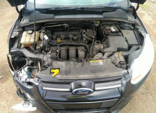 Photo 9 VIN: 1FAHP3F25CL378543 - FORD FOCUS 