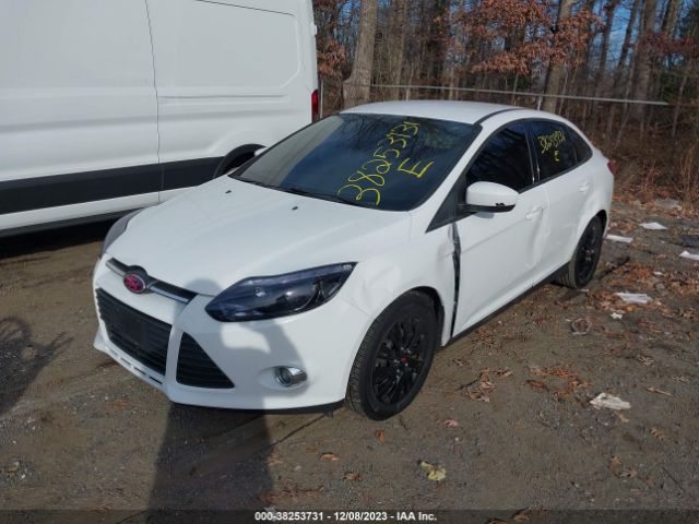 Photo 1 VIN: 1FAHP3F25CL454777 - FORD FOCUS 