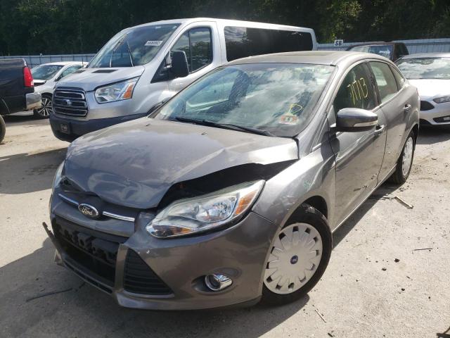 Photo 1 VIN: 1FAHP3F26CL113453 - FORD FOCUS SE 