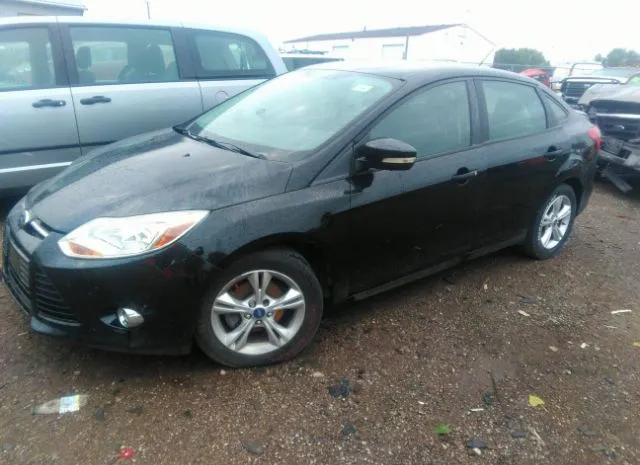 Photo 1 VIN: 1FAHP3F26CL266995 - FORD FOCUS 