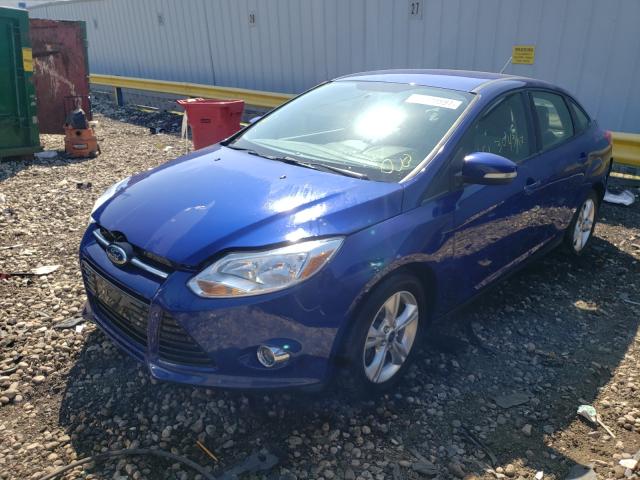 Photo 1 VIN: 1FAHP3F26CL300238 - FORD FOCUS SE 