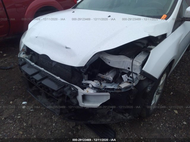 Photo 5 VIN: 1FAHP3F26CL309585 - FORD FOCUS 