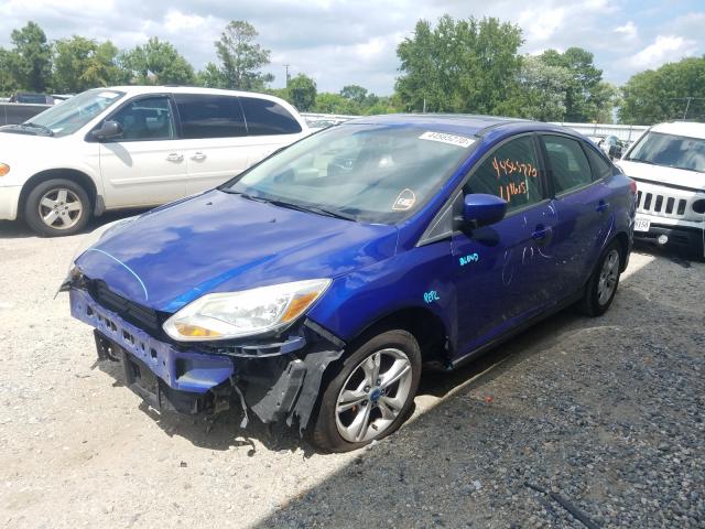 Photo 1 VIN: 1FAHP3F26CL328539 - FORD FOCUS SE 