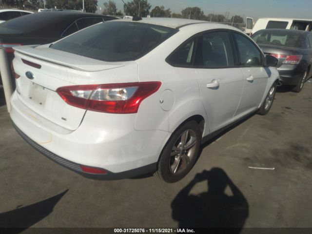 Photo 3 VIN: 1FAHP3F26CL386375 - FORD FOCUS 