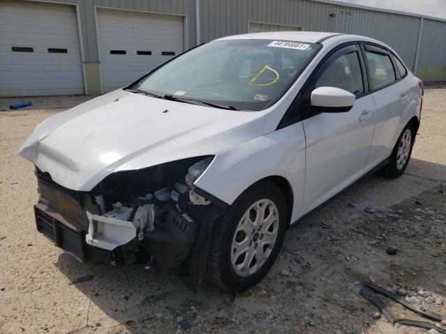 Photo 1 VIN: 1FAHP3F26CL390653 - FORD FOCUS SE 