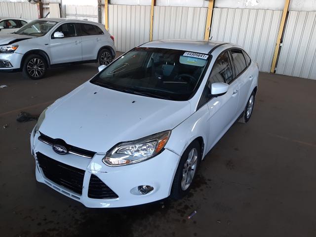 Photo 1 VIN: 1FAHP3F26CL429693 - FORD FOCUS 