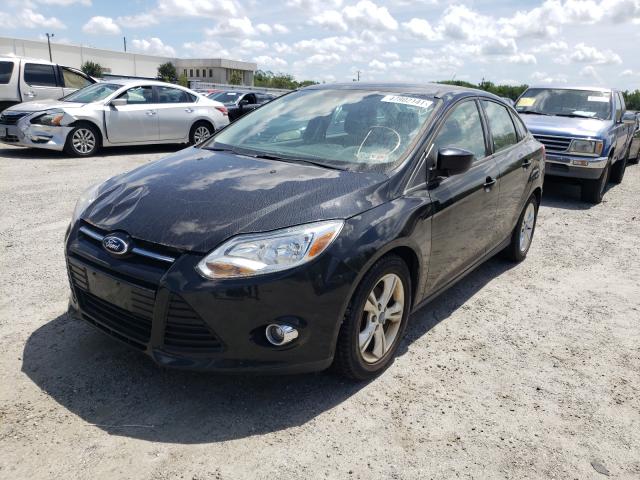 Photo 1 VIN: 1FAHP3F26CL460720 - FORD FOCUS SE 