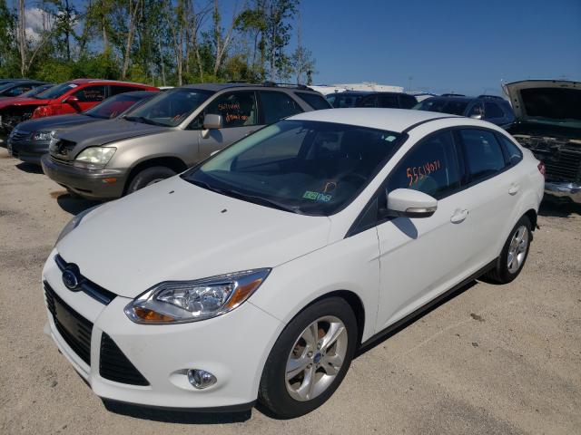 Photo 1 VIN: 1FAHP3F27CL166792 - FORD FOCUS SE 