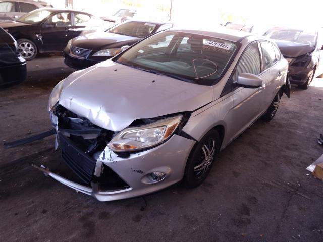 Photo 1 VIN: 1FAHP3F27CL211715 - FORD FOCUS SE 