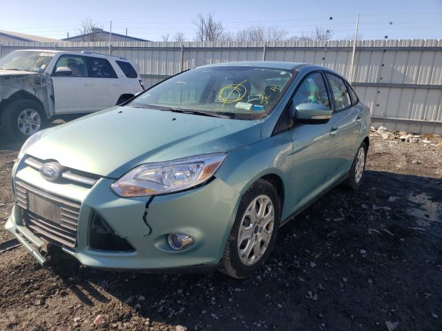 Photo 1 VIN: 1FAHP3F27CL292375 - FORD FOCUS SE 