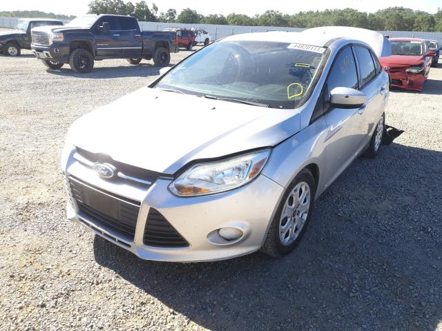 Photo 1 VIN: 1FAHP3F27CL302841 - FORD FOCUS SE 