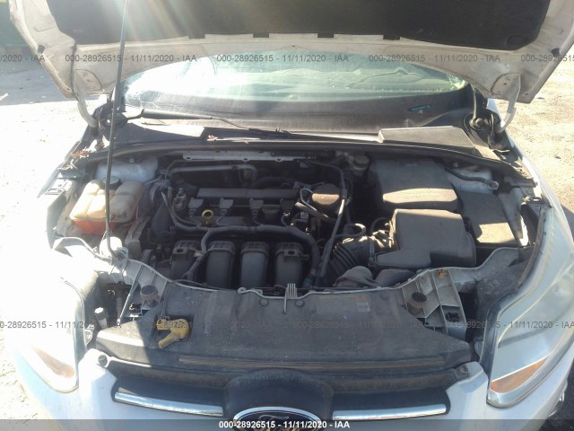 Photo 9 VIN: 1FAHP3F27CL395845 - FORD FOCUS 