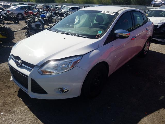 Photo 1 VIN: 1FAHP3F27CL403636 - FORD FOCUS SE 