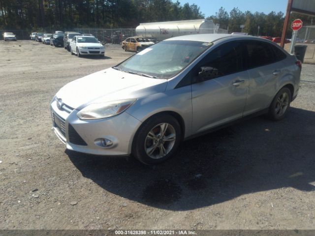 Photo 1 VIN: 1FAHP3F28CL282356 - FORD FOCUS 