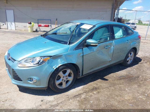 Photo 1 VIN: 1FAHP3F28CL330373 - FORD FOCUS 