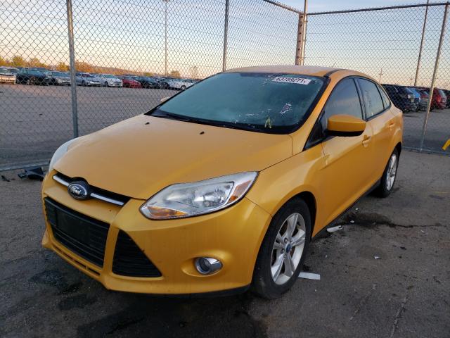 Photo 1 VIN: 1FAHP3F28CL381310 - FORD FOCUS SE 