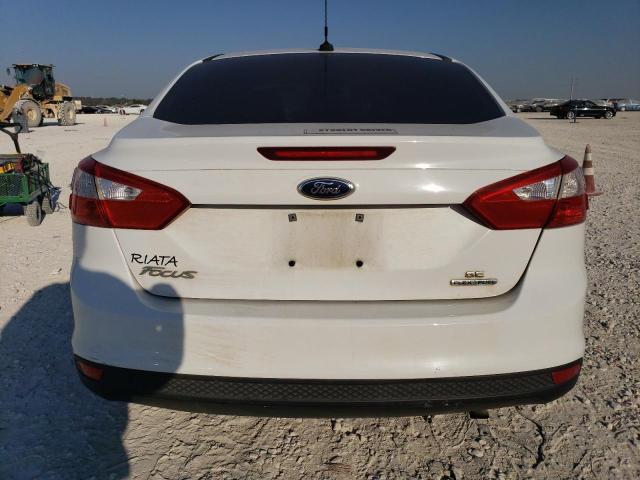 Photo 5 VIN: 1FAHP3F28CL400356 - FORD FOCUS SE 