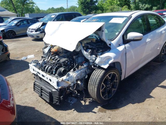 Photo 5 VIN: 1FAHP3F28CL413916 - FORD FOCUS 