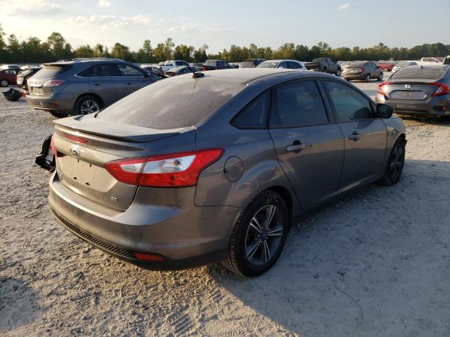 Photo 3 VIN: 1FAHP3F29CL129842 - FORD FOCUS SE 