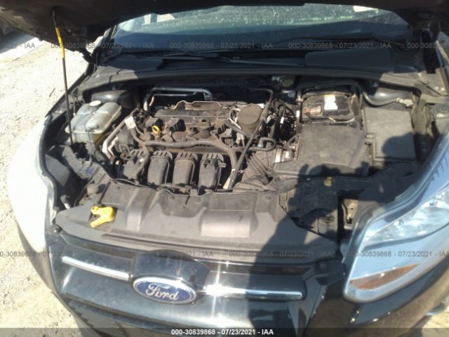 Photo 9 VIN: 1FAHP3F29CL166146 - FORD FOCUS 