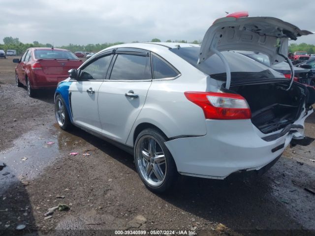 Photo 2 VIN: 1FAHP3F29CL172755 - FORD FOCUS 