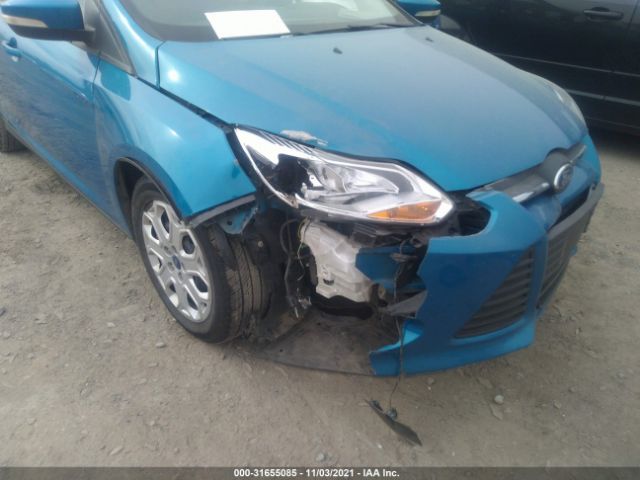 Photo 5 VIN: 1FAHP3F29CL215619 - FORD FOCUS 