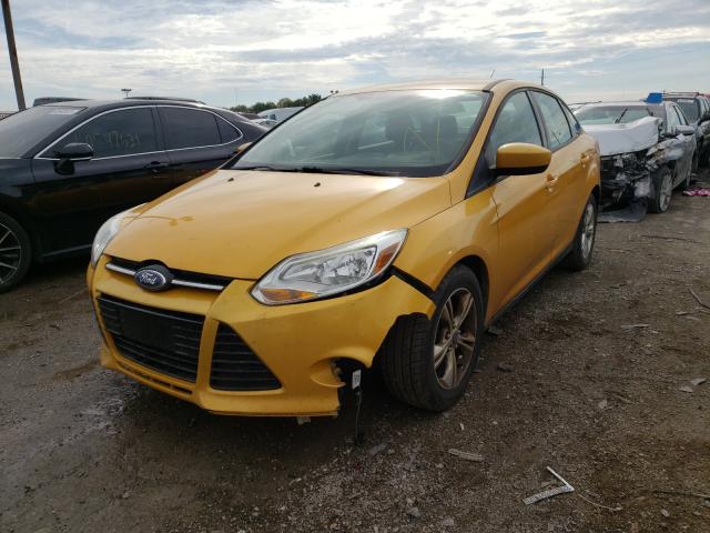 Photo 1 VIN: 1FAHP3F29CL311122 - FORD FOCUS SE 