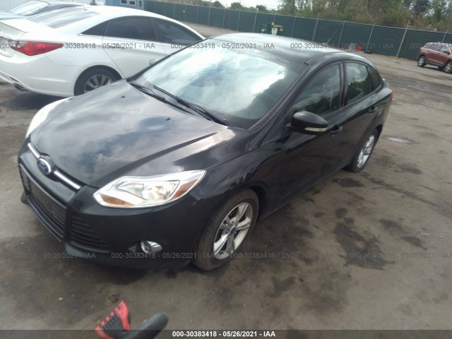 Photo 1 VIN: 1FAHP3F29CL320323 - FORD FOCUS 