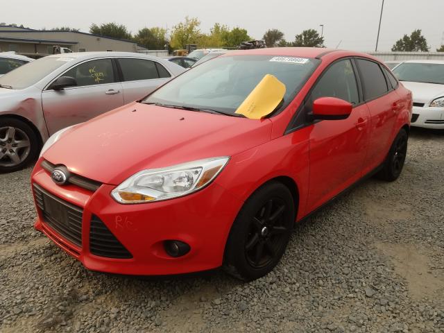 Photo 1 VIN: 1FAHP3F29CL382661 - FORD FOCUS SE 