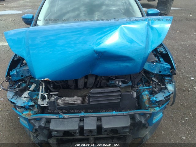 Photo 9 VIN: 1FAHP3F29CL385348 - FORD FOCUS 