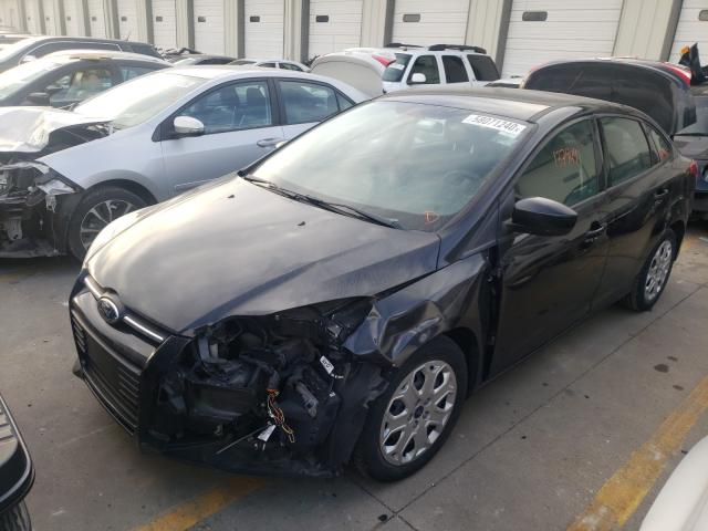 Photo 1 VIN: 1FAHP3F29CL414637 - FORD FOCUS SE 