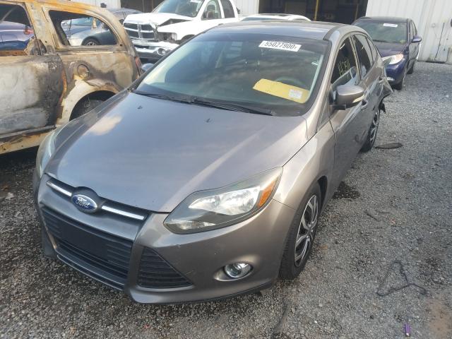 Photo 1 VIN: 1FAHP3F2XCL172585 - FORD FOCUS SE 