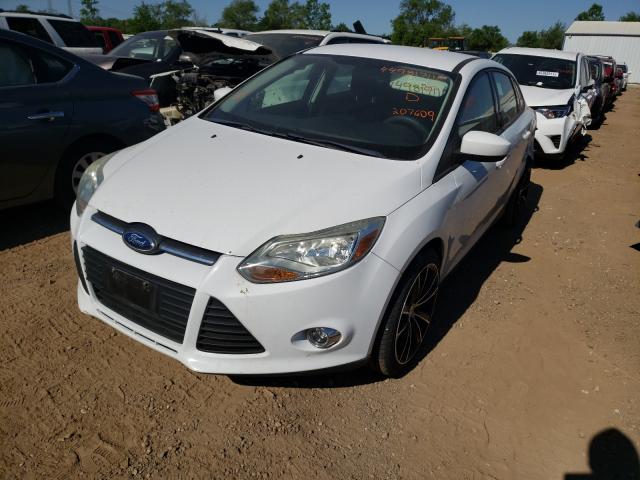 Photo 1 VIN: 1FAHP3F2XCL207609 - FORD FOCUS SE 