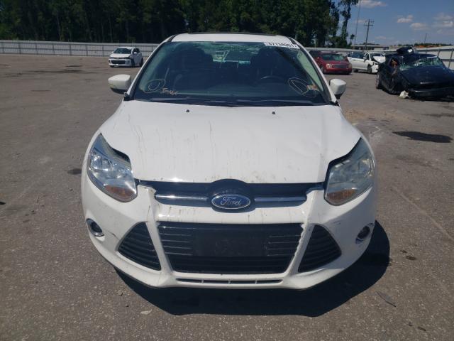 Photo 8 VIN: 1FAHP3F2XCL219081 - FORD FOCUS SE 