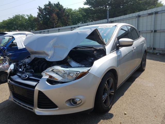 Photo 1 VIN: 1FAHP3F2XCL448117 - FORD FOCUS SE 