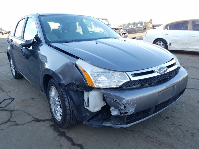 Photo 0 VIN: 1FAHP3FN0BW100477 - FORD FOCUS SE 