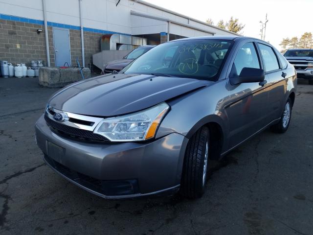 Photo 1 VIN: 1FAHP3FN0BW100477 - FORD FOCUS SE 