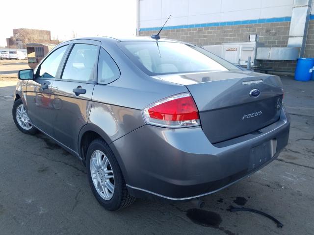 Photo 2 VIN: 1FAHP3FN0BW100477 - FORD FOCUS SE 