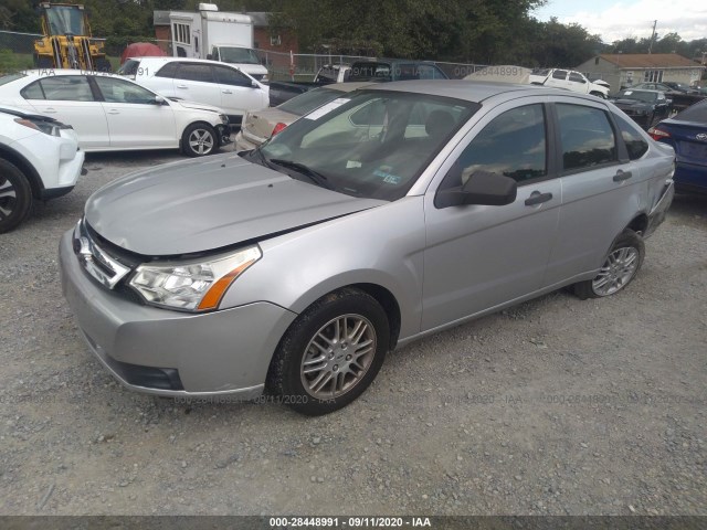 Photo 1 VIN: 1FAHP3FN1AW117822 - FORD FOCUS 